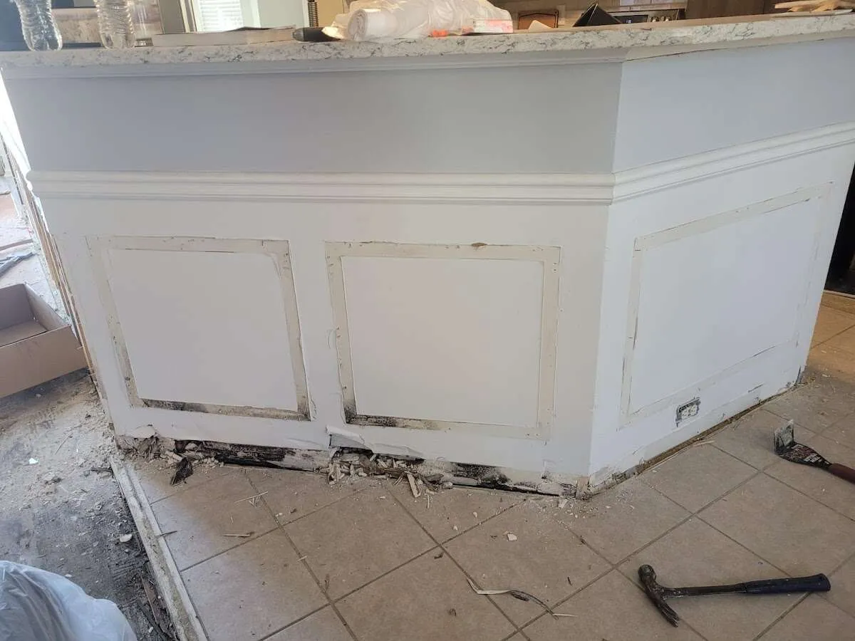 Water damage and mold on kitchen during Storm Damage Restoration in Natick
